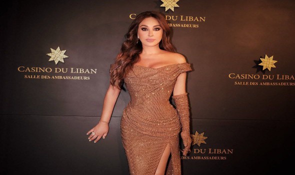 فساتين سهرة باللون البني تتألق في موسم الخريف بتوقيع نجمات العالم العربي